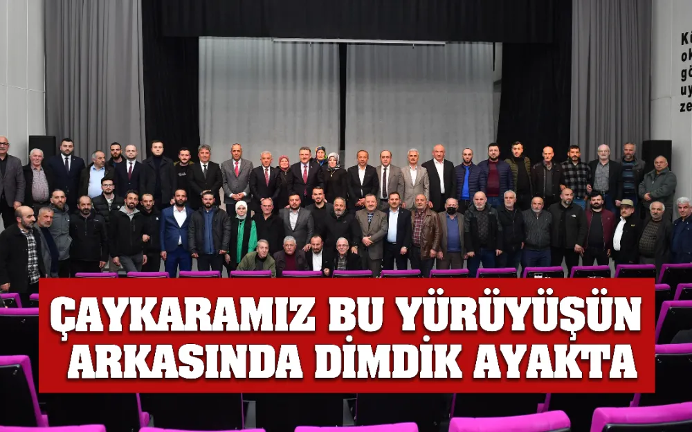 ÇAYKARAMIZ BU YÜRÜYÜŞÜN ARKASINDA DİMDİK AYAKTA